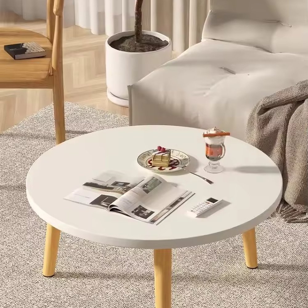 Round coffee table in a living room setting
