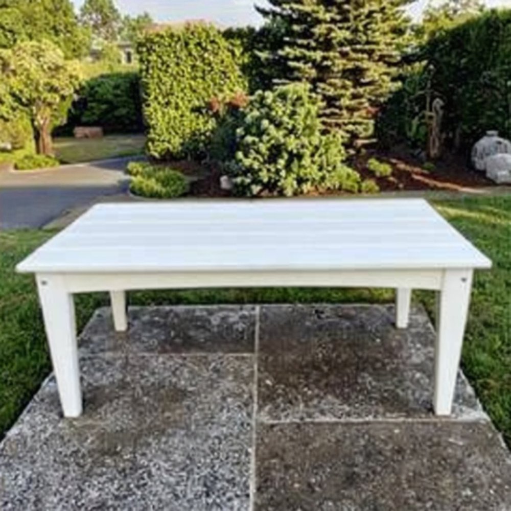 White plastic outdoor dining table